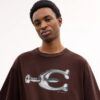 Χαλαρό T-shirt με μεταλλικά στοιχεία από βιολογικό βαμβακερό ύφασμα