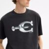 Χαλαρό T-shirt με μεταλλικά στοιχεία από βιολογικό βαμβακερό ύφασμα