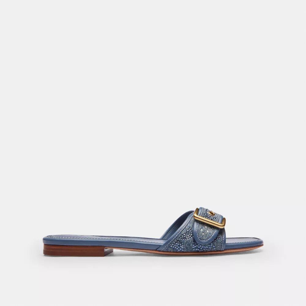 Επίπεδα σανδάλια Margot σε κρυστάλλινο χαρακτηριστικό τζιν