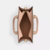 Μικρή τσάντα Maggie από Signature Canvas