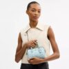 Μίνι τσάντα Rowan Crossbody από Signature Canvas