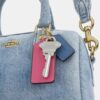 Μίνι τσάντα Rowan για φορά χιαστί από «Loved Denim» με γούρια
