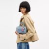 Μίνι τσάντα Rowan για φορά χιαστί από «Loved Denim» με γούρια
