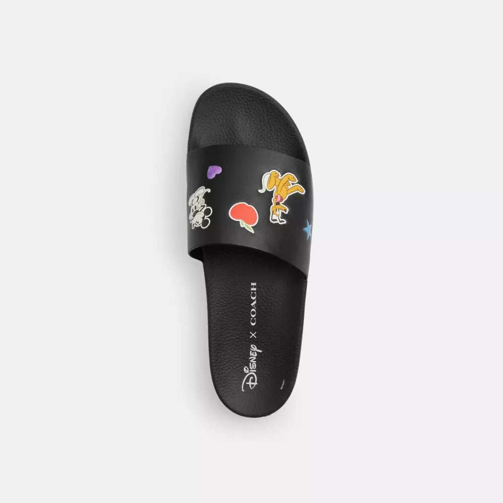 Παντόφλες Disney X Coach με τυπωμένα αυτοκόλλητα
