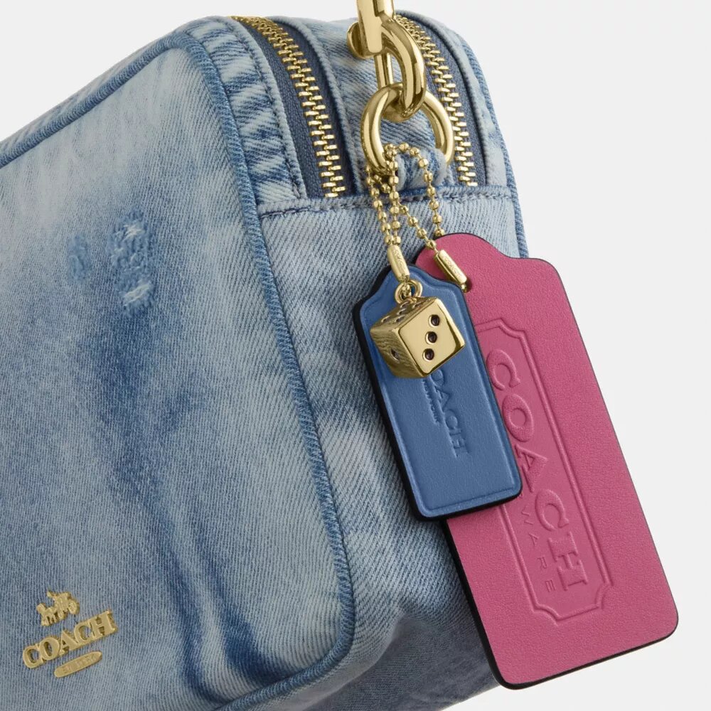 Τσάντα Carey για φορά χιαστί σε Loved Denim με γούρια
