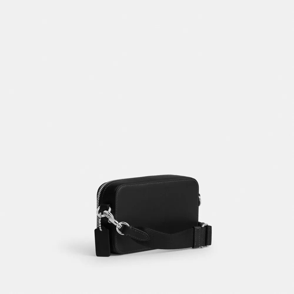 Τσάντα Charter Slim Crossbody της Disney X Coach με τύπωμα αυτοκόλλητων