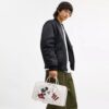 Τσάντα Disney X Coach Compass 35 με τον Μίκυ Μάους