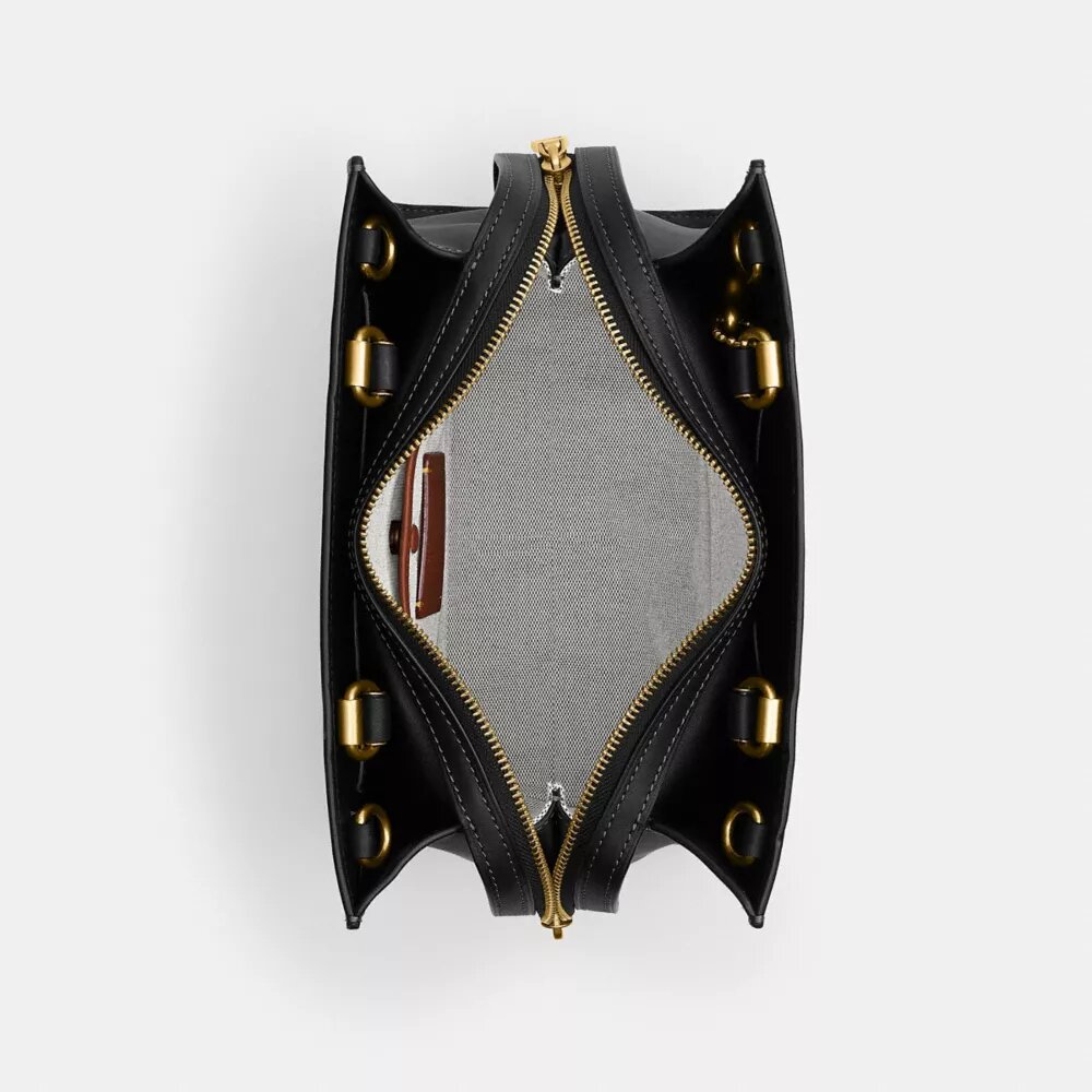 Τσάντα Disney X Coach Rogue 25 με τον Πλούτο