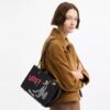 Τσάντα Disney X Coach Rogue 25 με τον Πλούτο