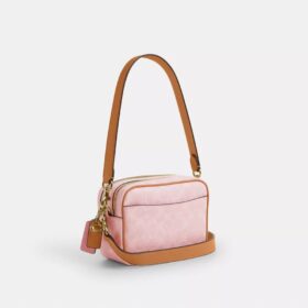Τσάντα Mini Carey για φορά χιαστί από Signature Canvas με Γούρια