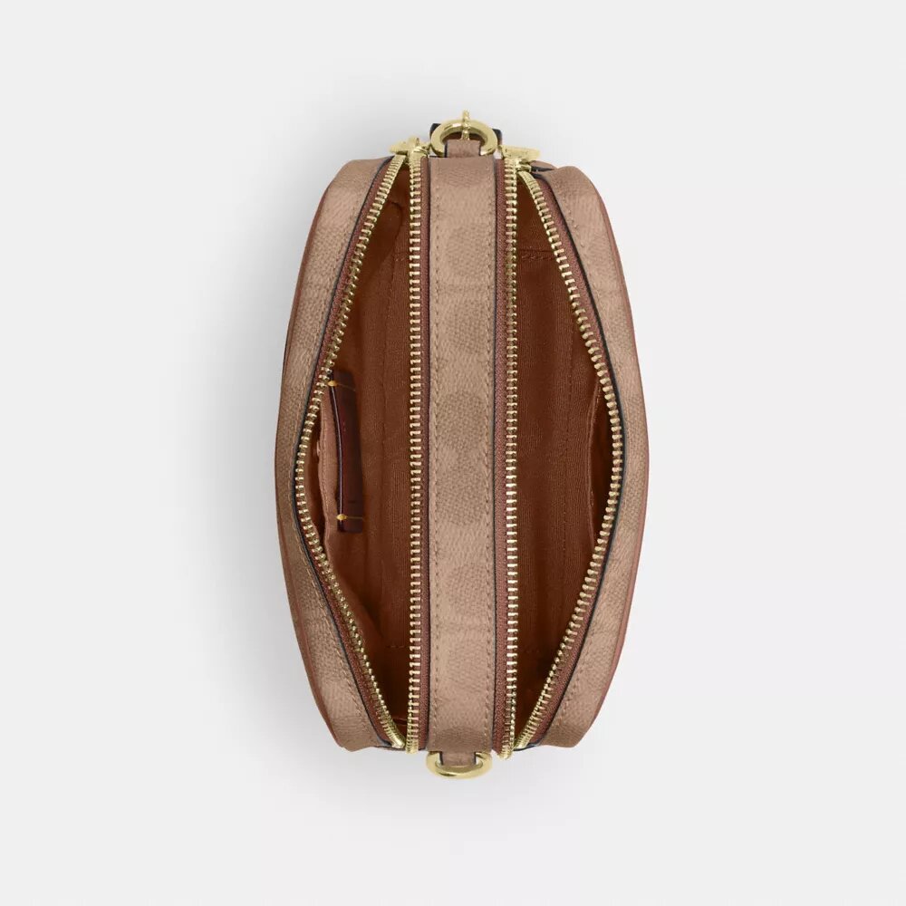 Τσάντα Mini Carey για φορά χιαστί από το Signature Canvas