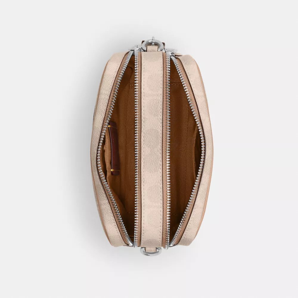 Τσάντα Mini Carey για φορά χιαστί από το Signature Canvas