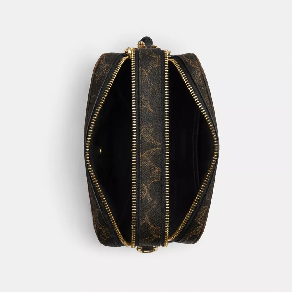 Τσάντα Mini Carey για φορά χιαστί από το Signature Canvas