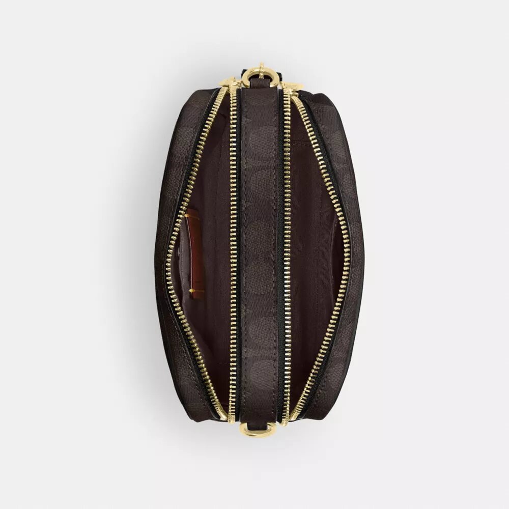 Τσάντα Mini Carey για φορά χιαστί από το Signature Canvas