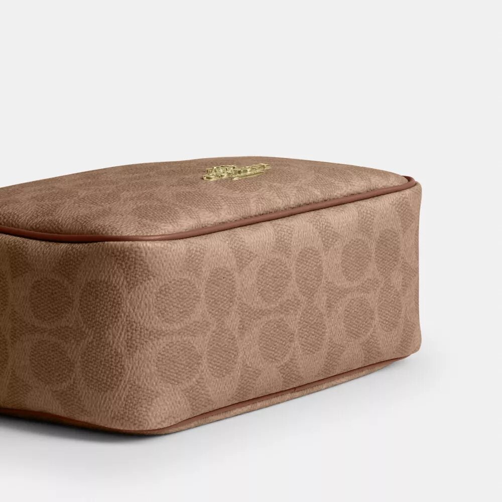 Τσάντα Mini Carey για φορά χιαστί από το Signature Canvas