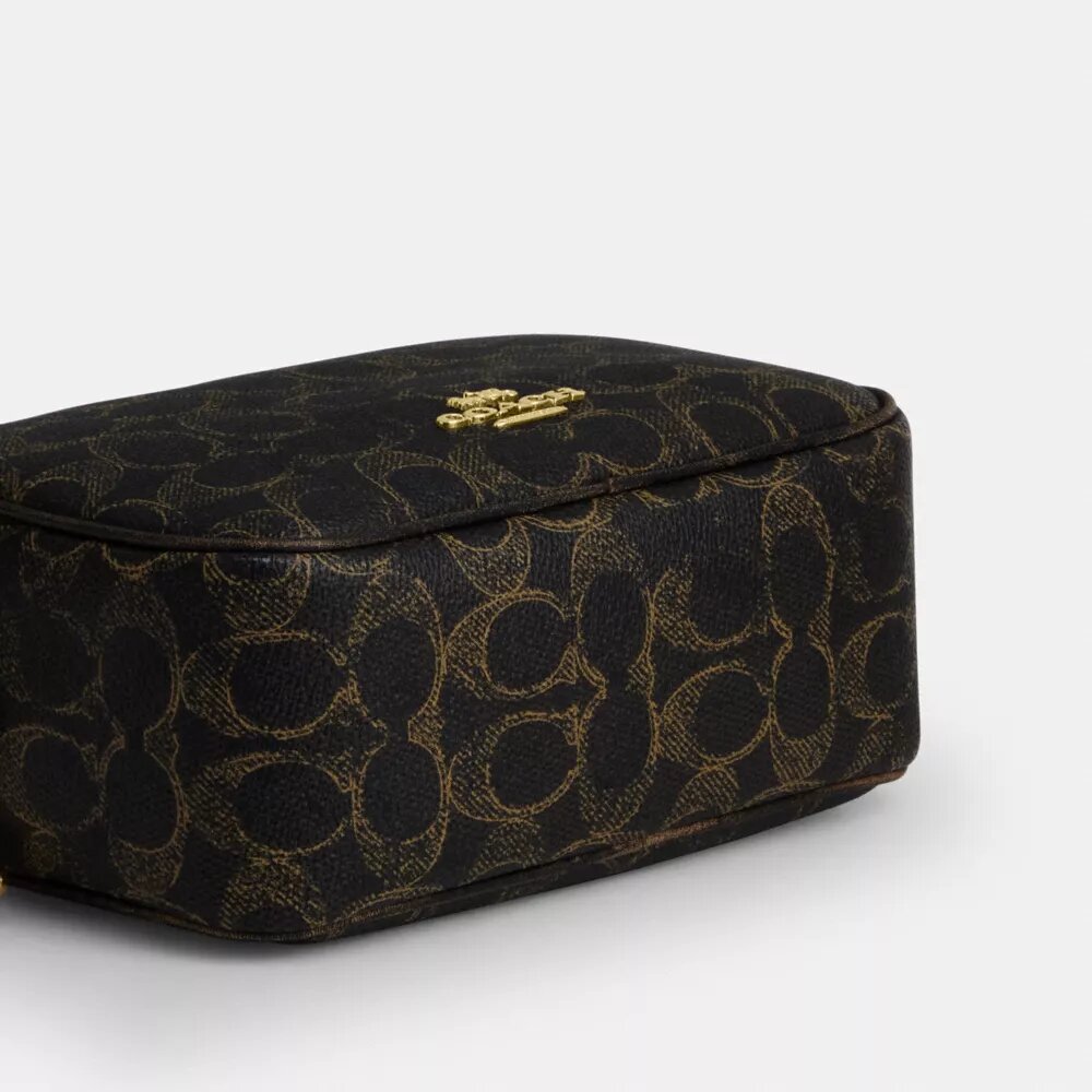 Τσάντα Mini Carey για φορά χιαστί από το Signature Canvas