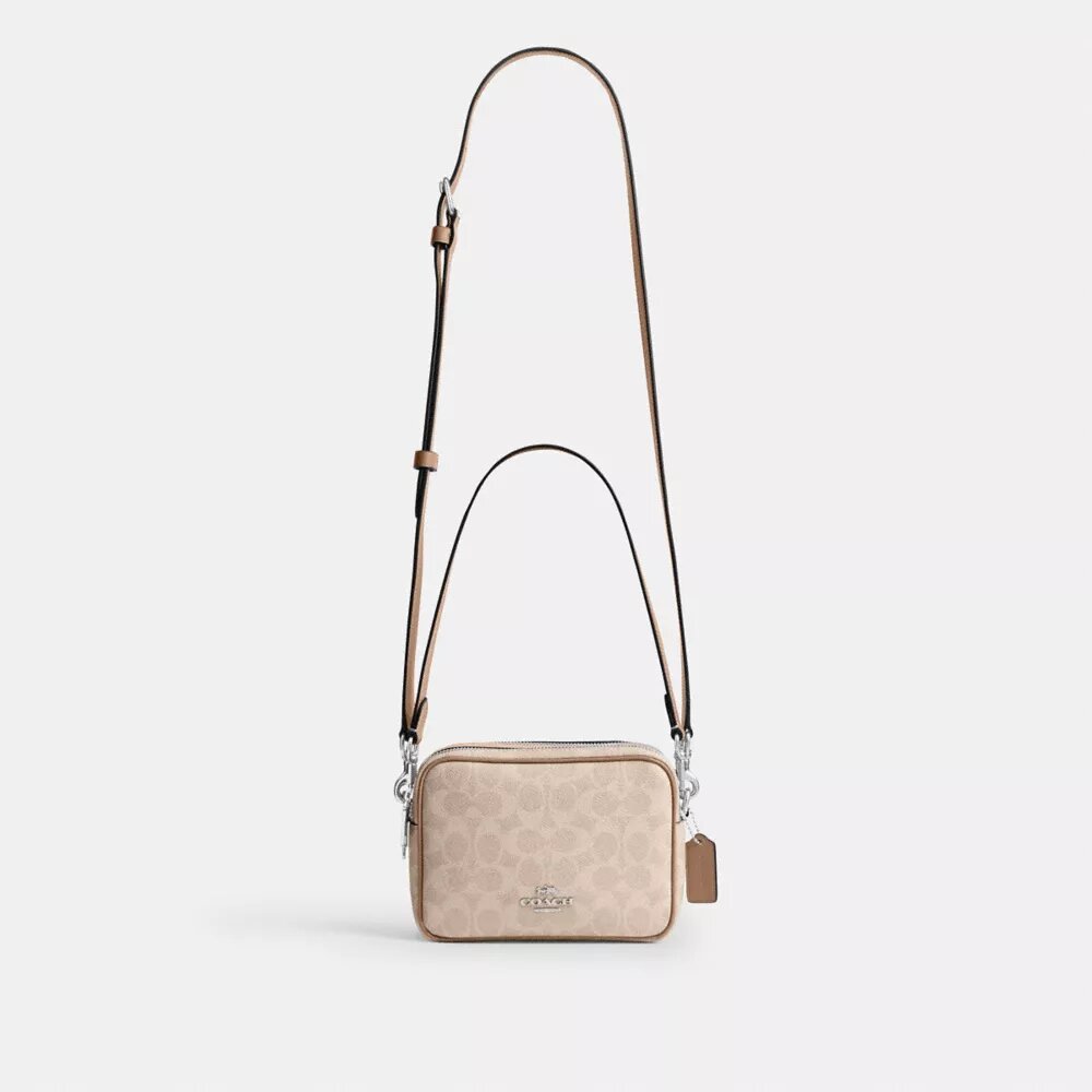Τσάντα Mini Carey για φορά χιαστί από το Signature Canvas