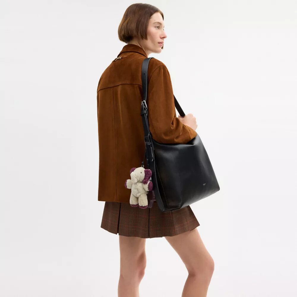 Τσάντα Mott Messenger 38 από παλαιωμένο δέρμα με γούρια