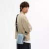Τσάντα Tristan Χιαστί 14 in από το αγαπημένο Signature Denim με Γούρια