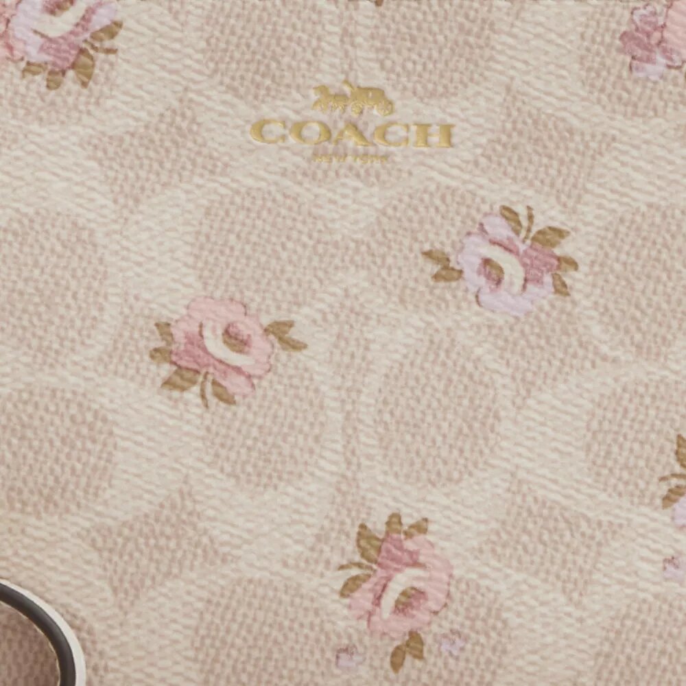 Τσαντάκι καρπού με φερμουάρ στη γωνία από Signature Canvas με floral μοτίβο